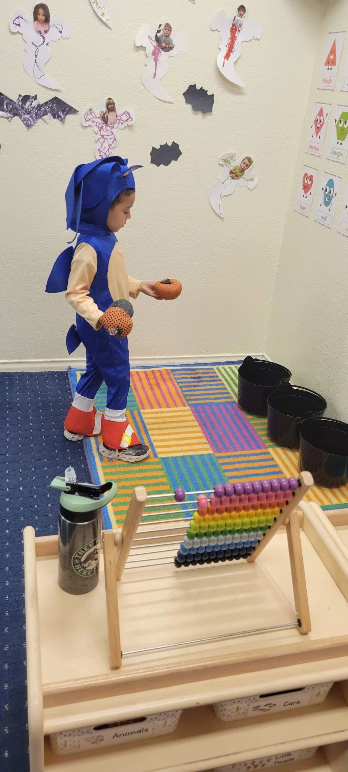 Child in Sonic the Hedgehog costume in classroom